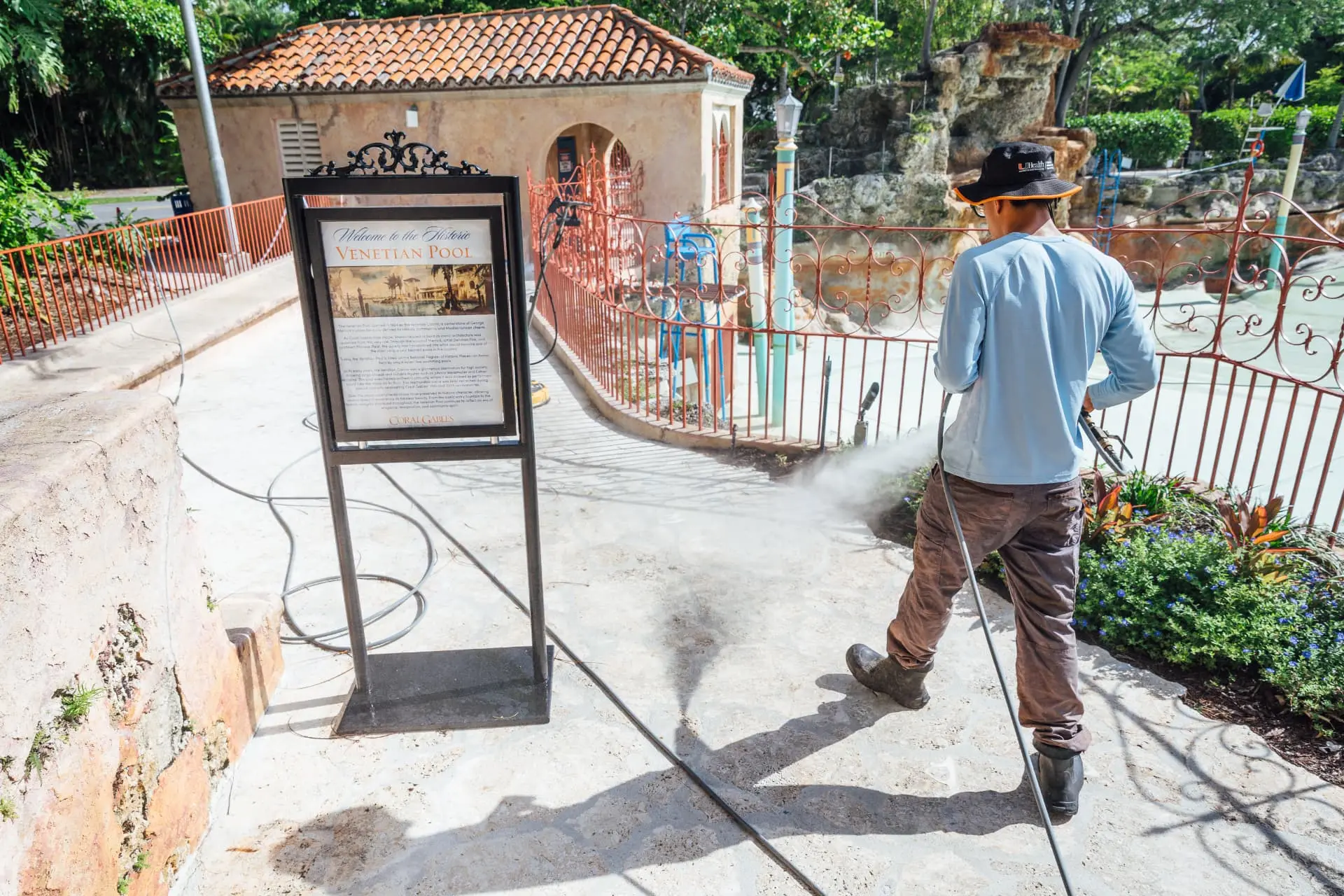 Miami Vice Softwash technician pressure washing at the historic Venetian Pool in Coral Gables